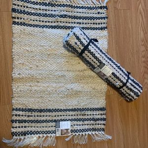 2- matching hearth and hand accent rugs-24x36